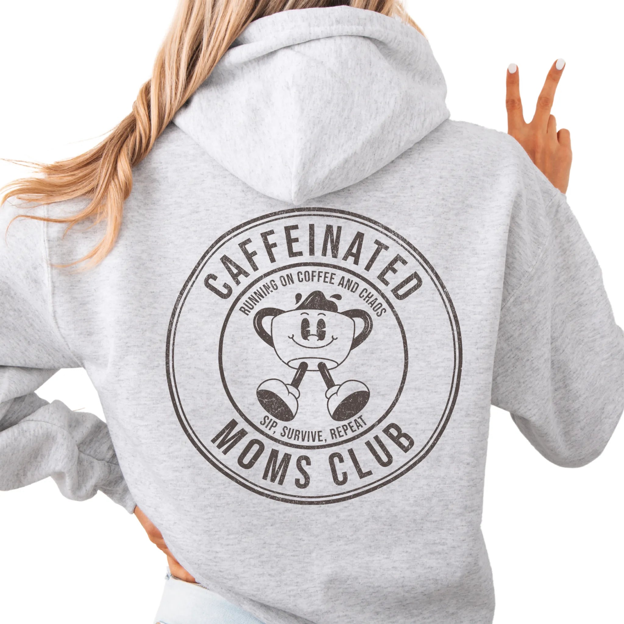 Ash Oakley June Hoodie back view Caffeinated Moms Club large circle badge coffee cup mascot text Running on Coffee and Chaos Sip Survive Repeat distressed print
