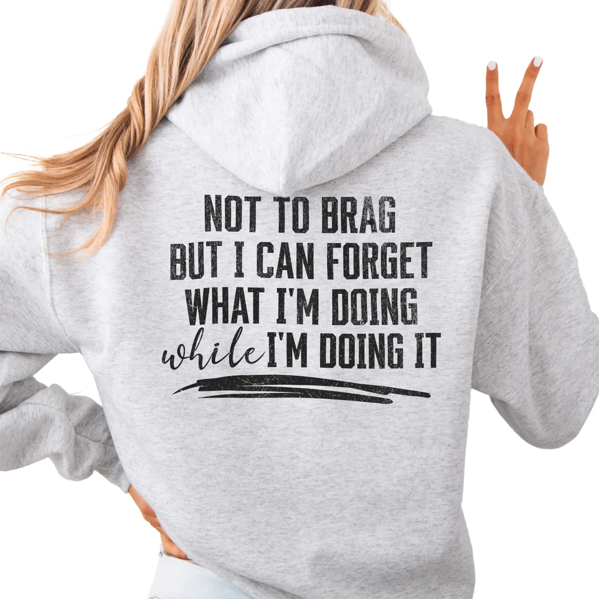 Ash Oakley June Hoodie back view large text Not To Brag But I Can Forget What I’m Doing While I’m Doing It underline distressed print