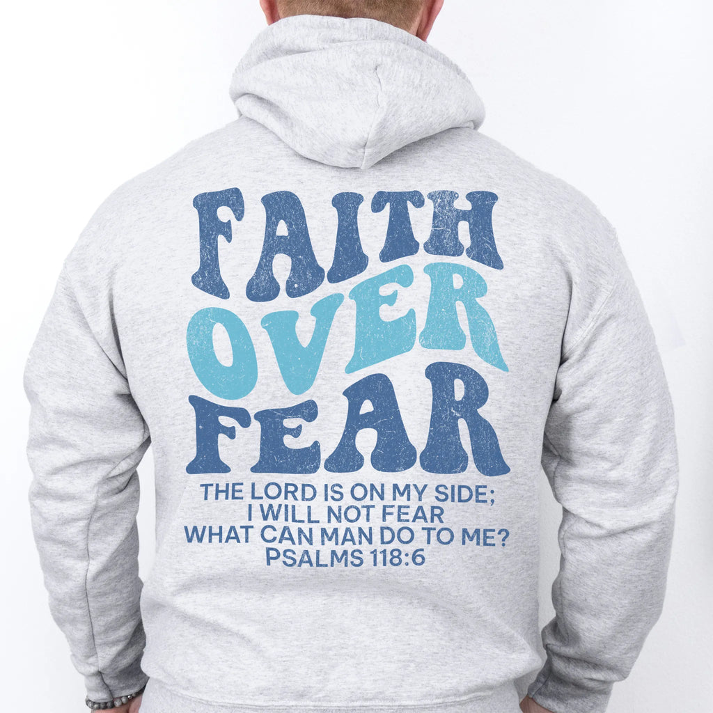 Ash Oakley June hoodie, mens fit, large back lettering reads Faith Over Fear with supporting scripture lines, hood up, studio back view