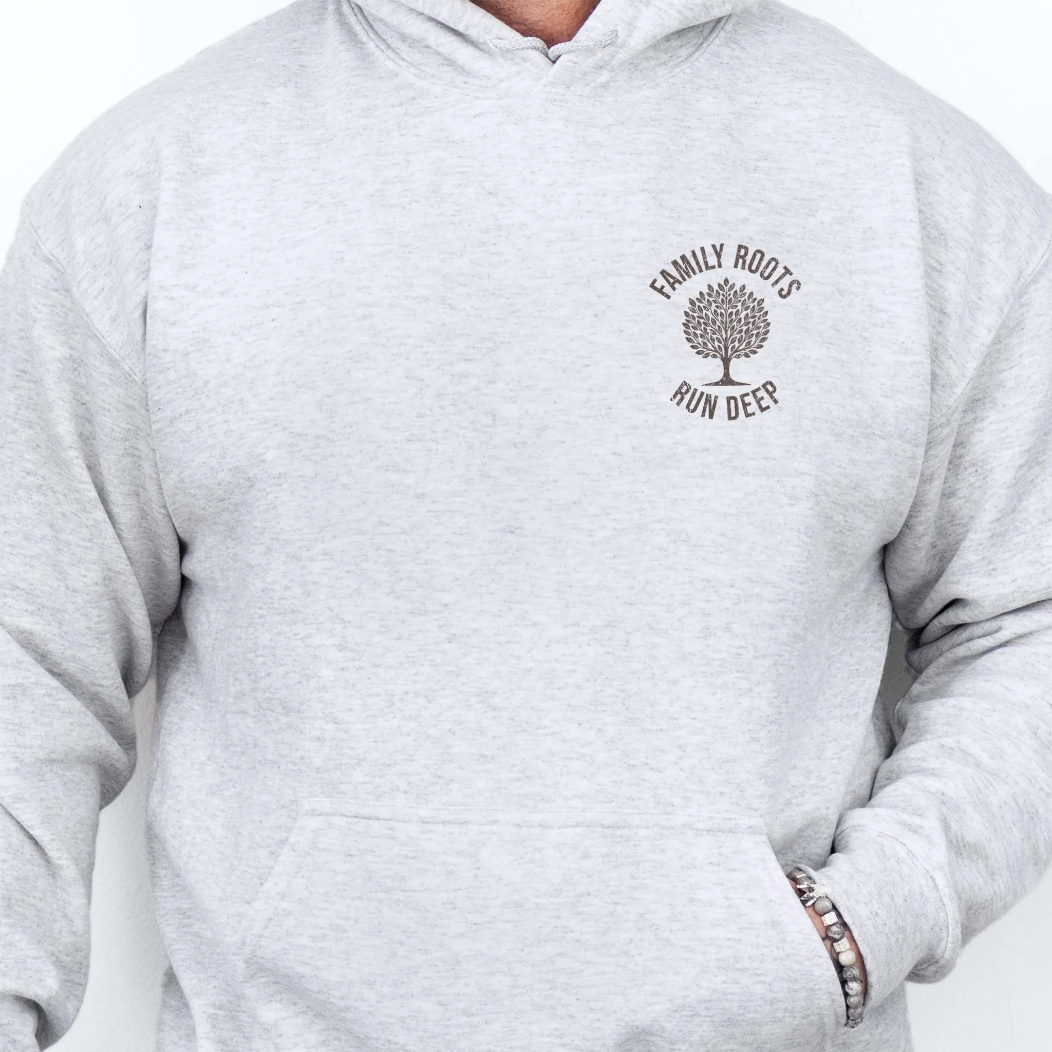 Ash Oakley June hoodie left chest tree badge reading Family Roots Run Deep