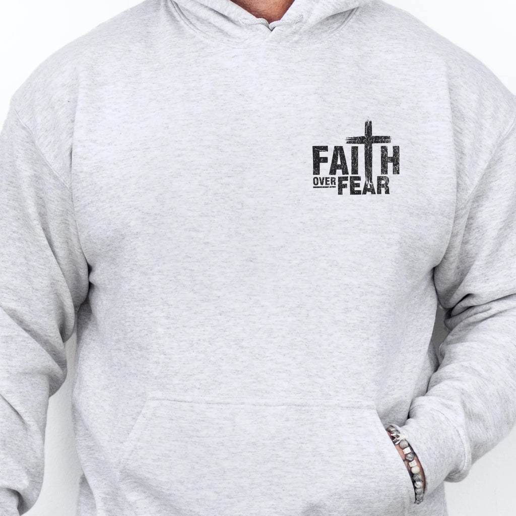 Ash Oakley June hoodie, mens fit, left chest badge reads Faith Over Fear with cross, kangaroo pocket, studio front view
