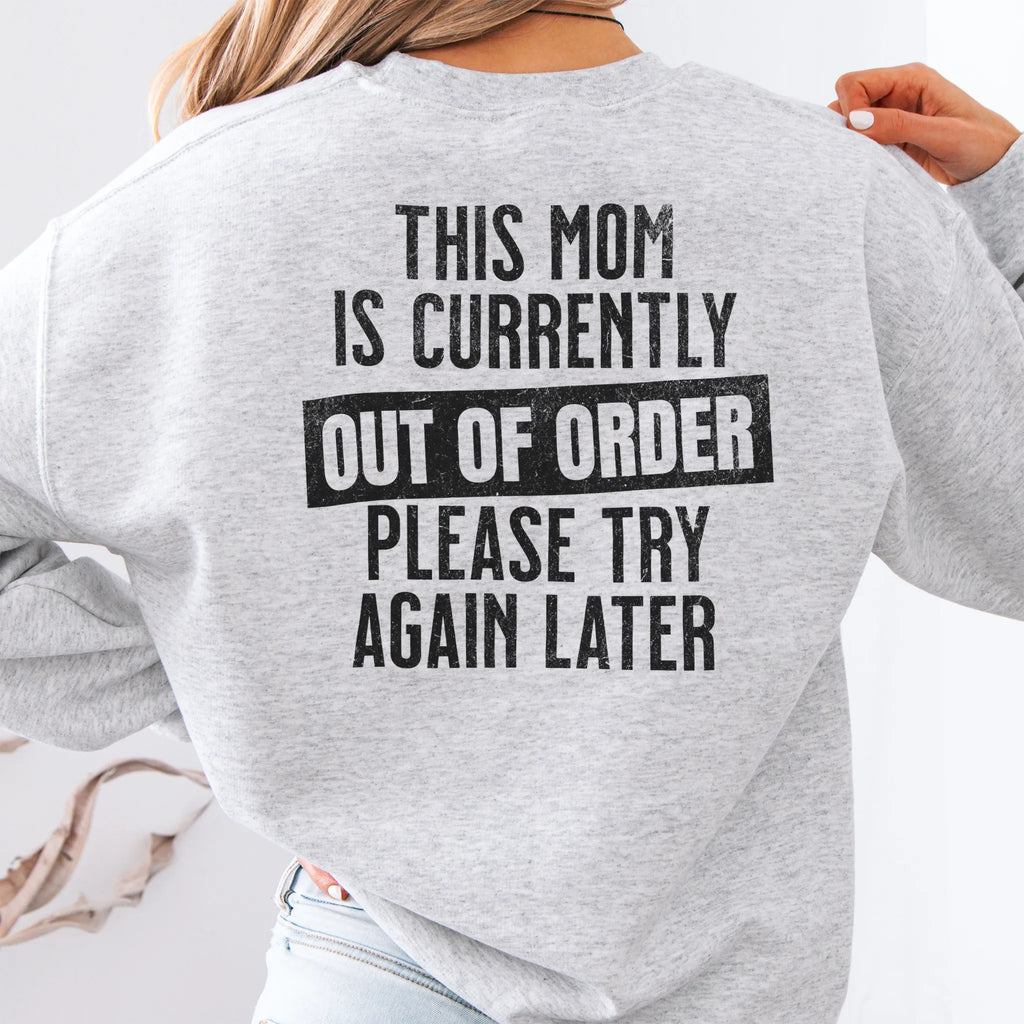 Ash sweatshirt – large back text “This Mom Is Currently Out of Order, Please Try Again Later”, relaxed modern fit, studio back view