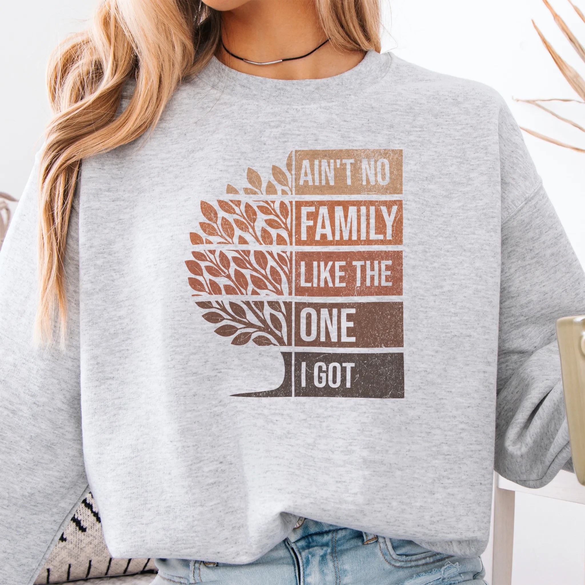 Ash Oakley June sweatshirt bold front print Ain’t No Family Like the One I Got with tree graphic