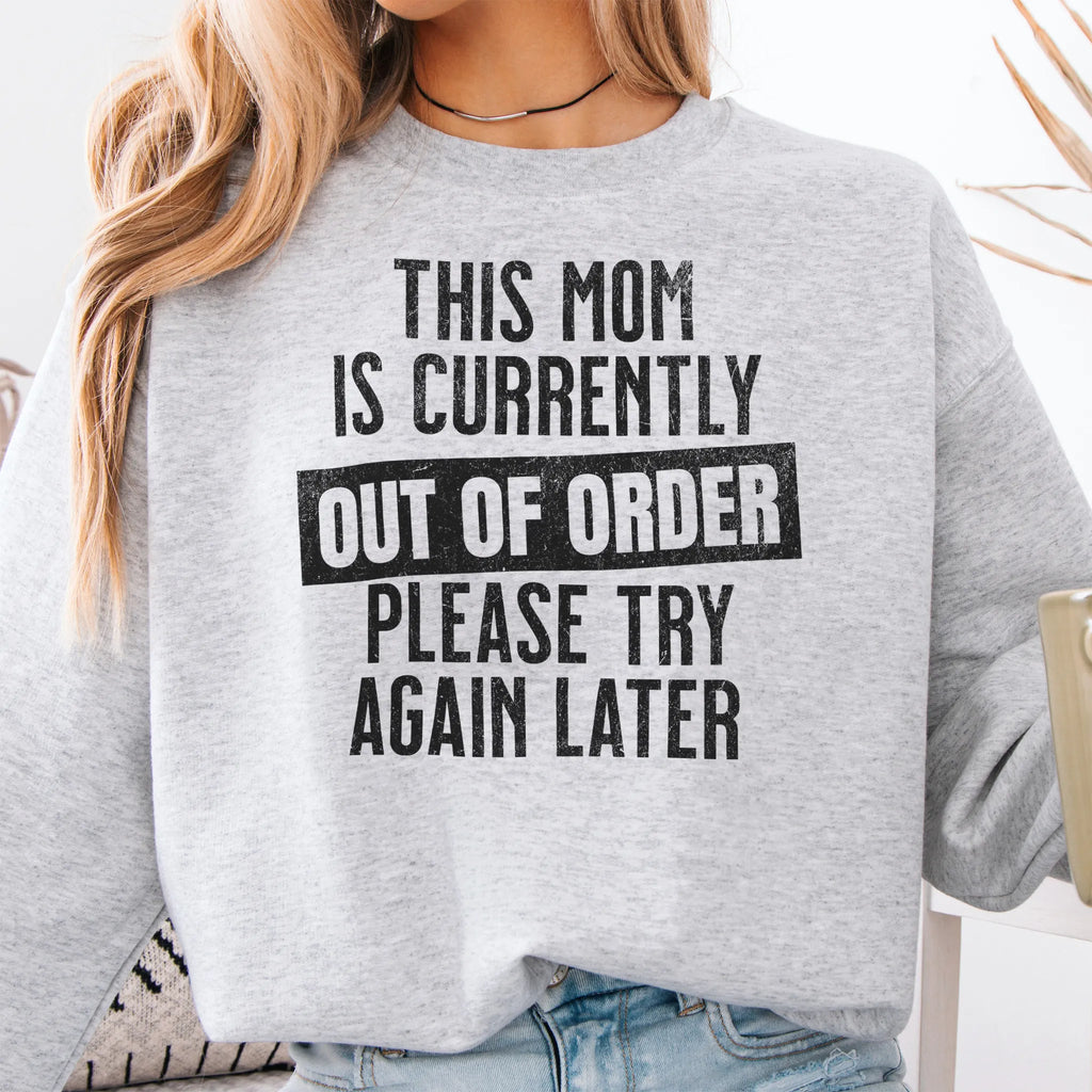 Ash sweatshirt – large front text reads “This Mom Is Currently Out of Order, Please Try Again Later”, relaxed modern fit, cropped to torso, studio front view