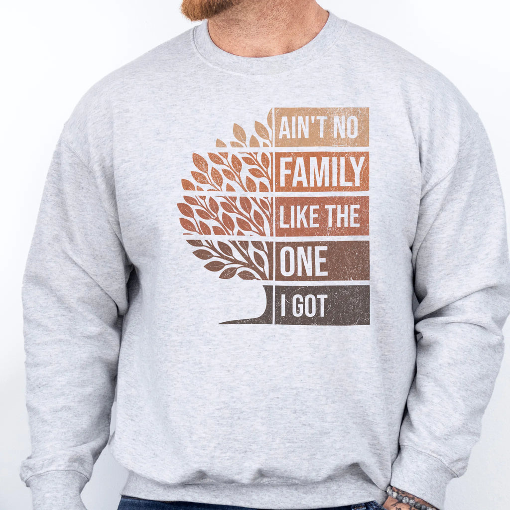 Ash Oakley June Sweatshirt – front only oversized tree graphic with text Ain’t No Family Like the One I Got, cozy unisex crewneck