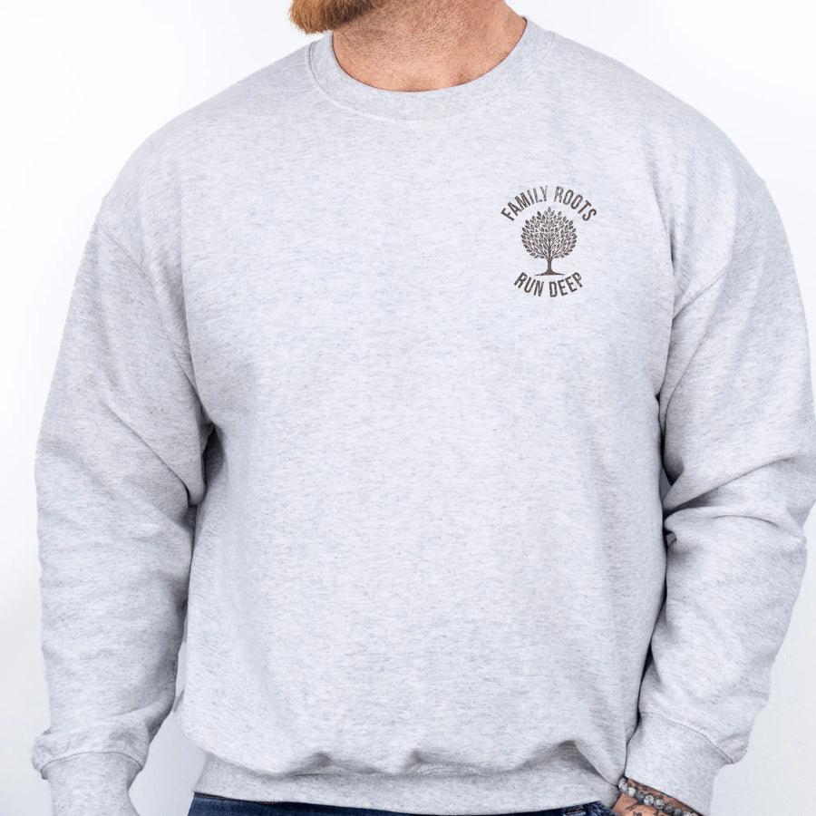 Ash Oakley June sweatshirt left chest tree badge reading Family Roots Run Deep
