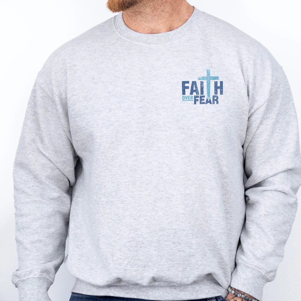 Ash Oakley June sweatshirt, mens fit, left chest badge reads Faith Over Fear with small cross, studio front view