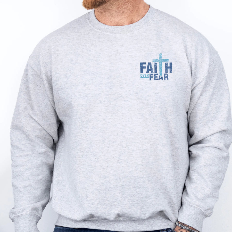 Ash Oakley June sweatshirt, mens fit, left chest badge reads Faith Over Fear with small cross, studio front view