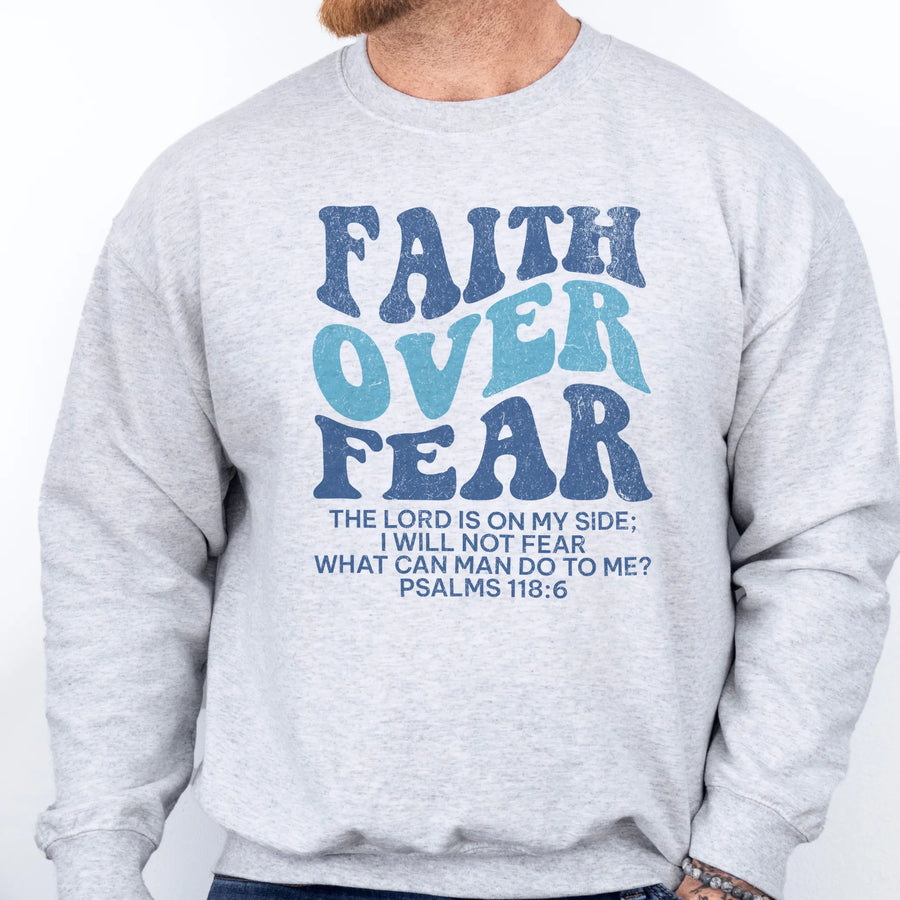 Ash Oakley June sweatshirt, mens fit, large front lettering reads Faith Over Fear with supporting lines The Lord Is On My Side I Will Not Fear What Can Man Do To Me, studio front view
