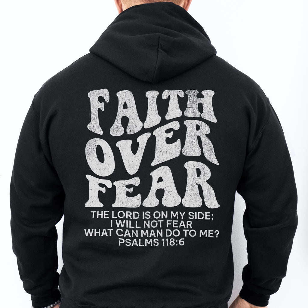 Black Oakley June hoodie, mens fit, large back lettering reads Faith Over Fear with supporting scripture lines, studio back view
