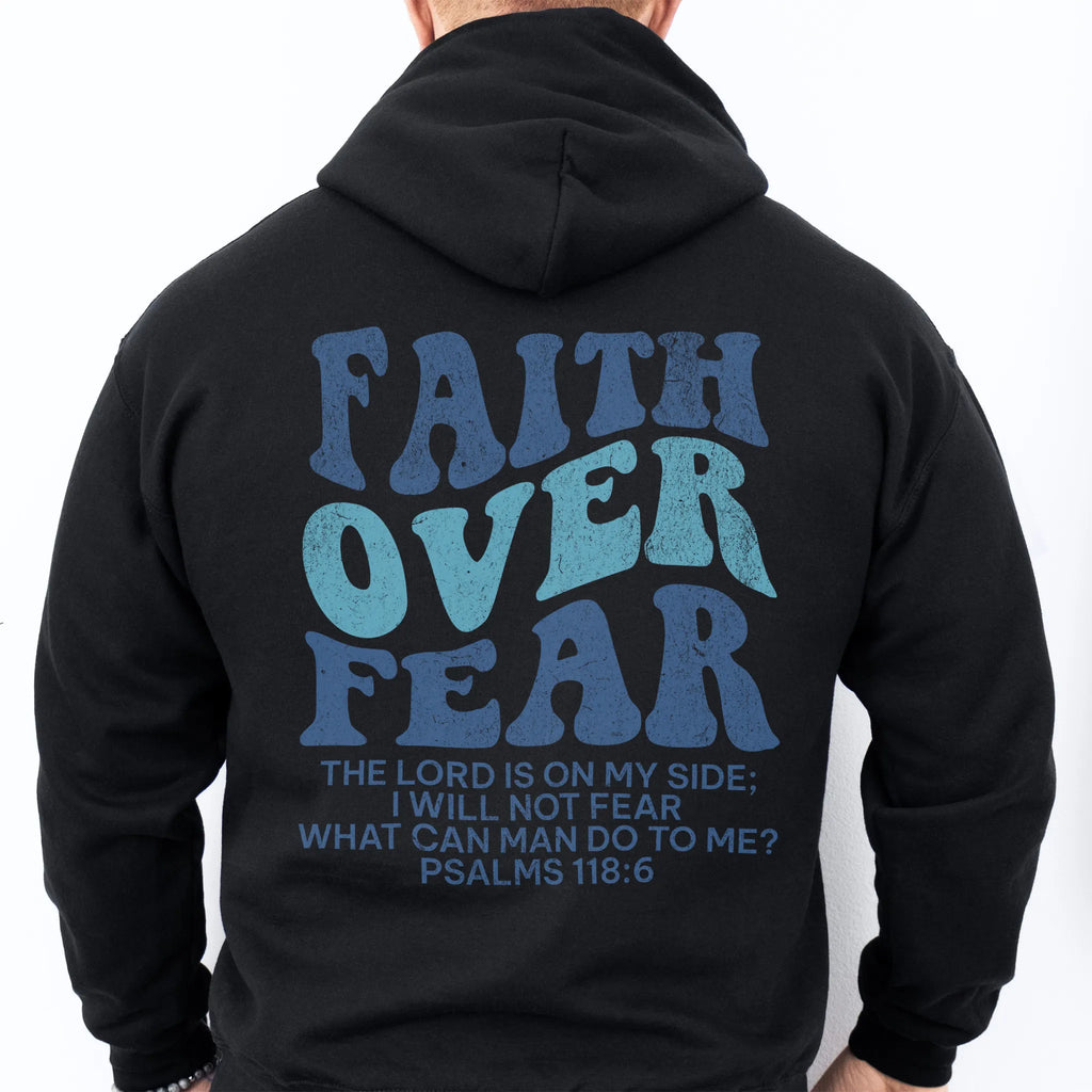 Black Oakley June hoodie, mens fit, large back lettering reads Faith Over Fear with supporting scripture lines, hood up, studio back view