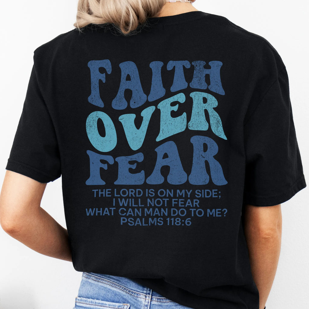 Black Oakley June t shirt, large back lettering reads Faith Over Fear with supporting scripture lines, studio back view