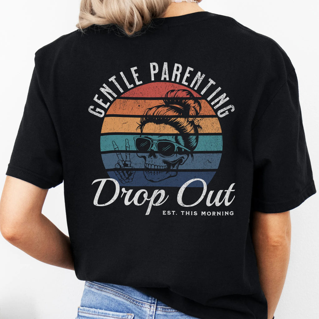 Black Oakley June T Shirt back view Gentle Parenting Drop Out large round retro badge skull with messy bun wearing sunglasses peace sign script Est This Morning distressed print