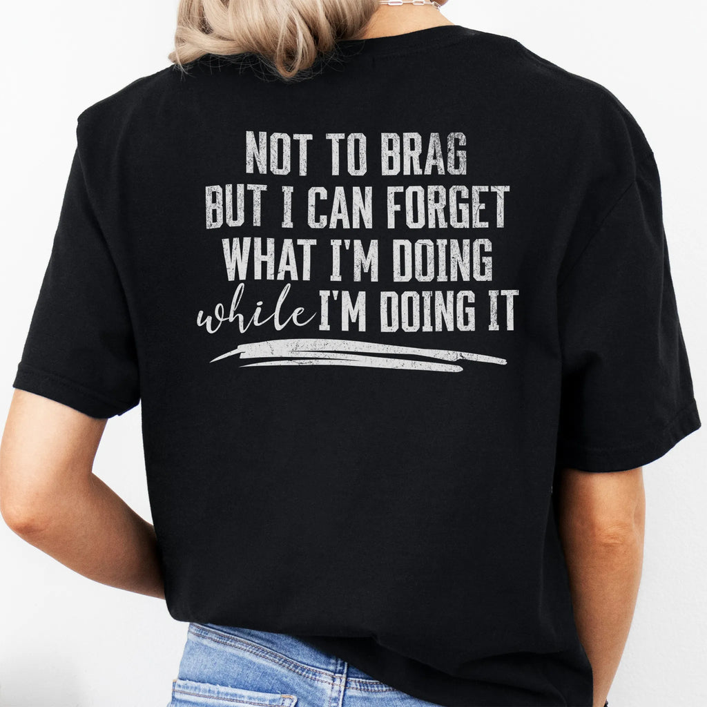 Black Oakley June T Shirt back view large text Not To Brag But I Can Forget What I’m Doing While I’m Doing It underline distressed print