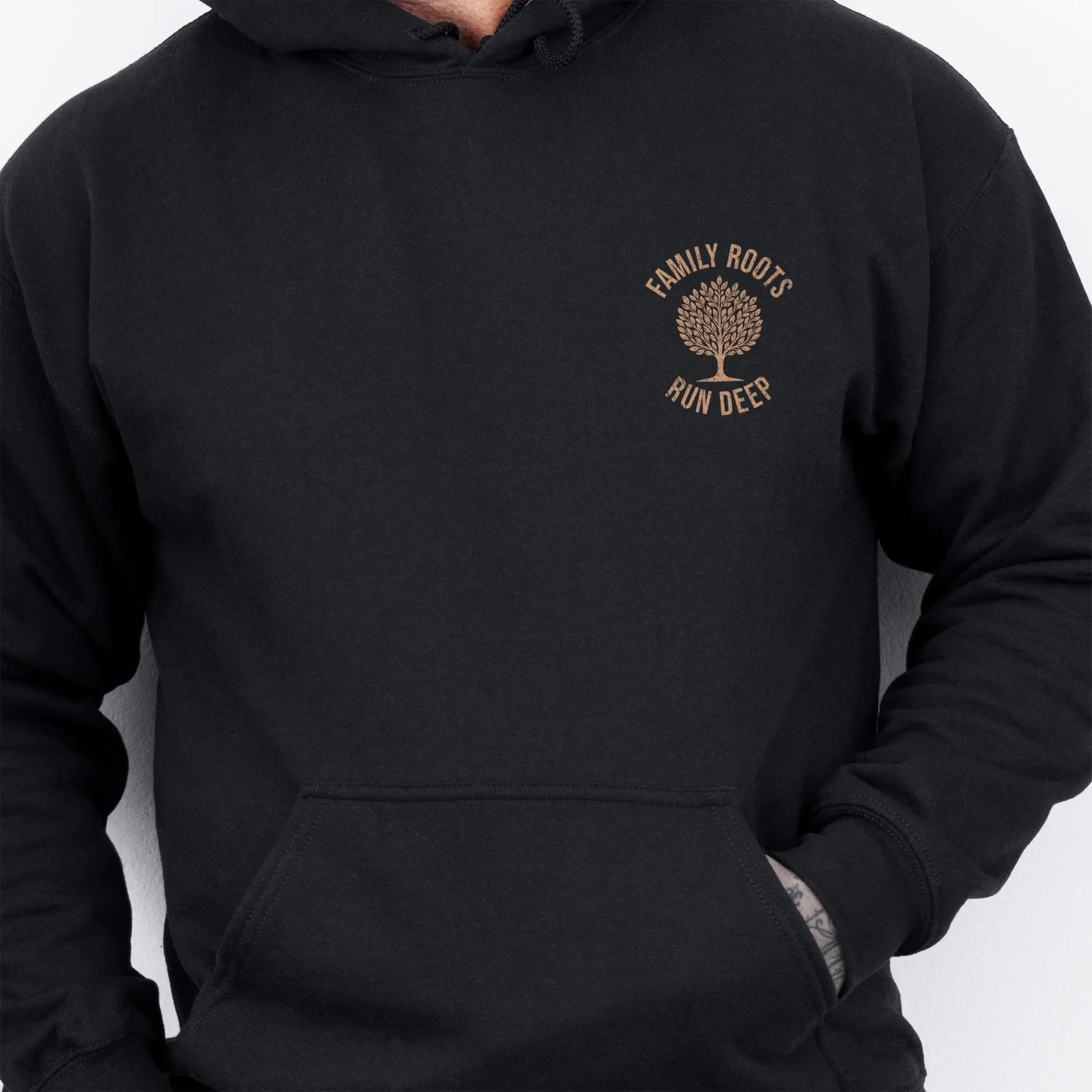 Black Oakley June Hoodie – left chest tree badge with text Family Roots Run Deep, cozy unisex pullover