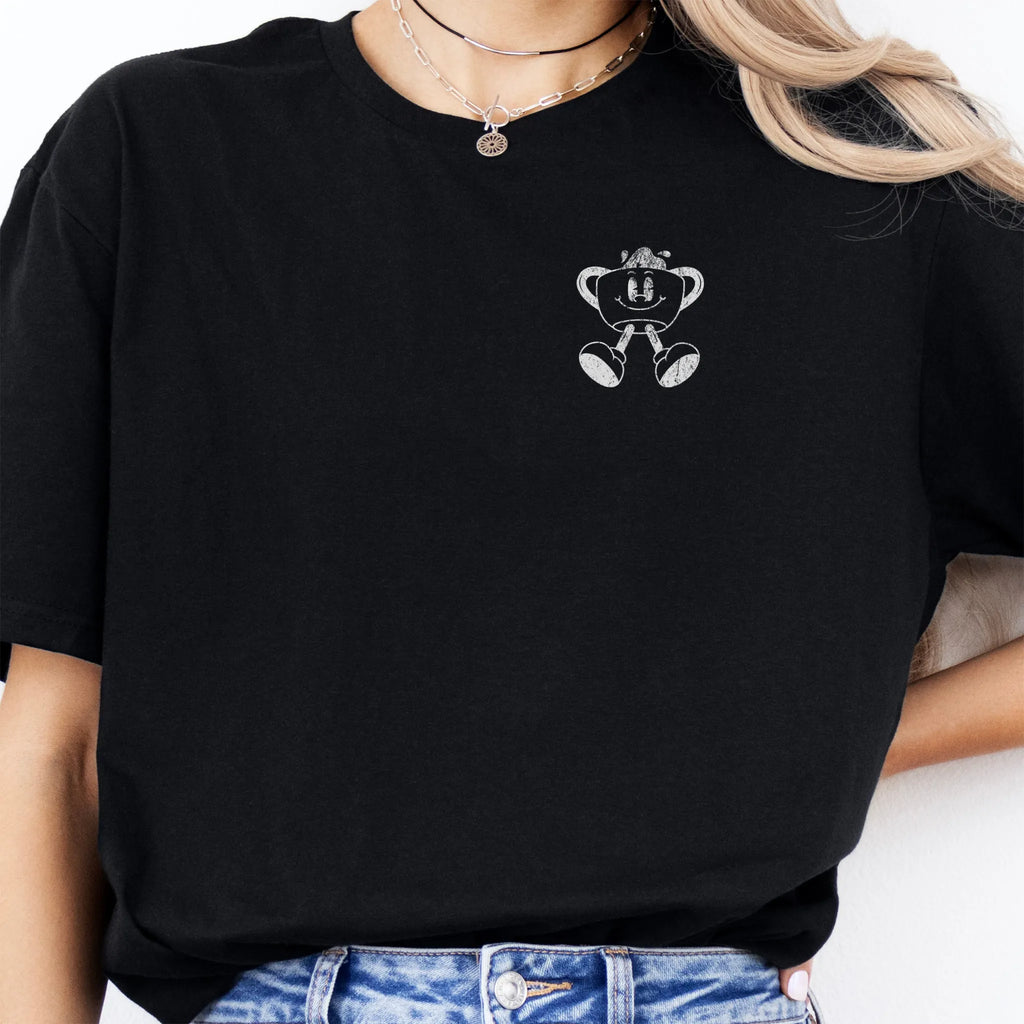 Black Oakley June T Shirt front view small left chest coffee cup mascot Caffeinated Moms Club minimal ink distressed detail