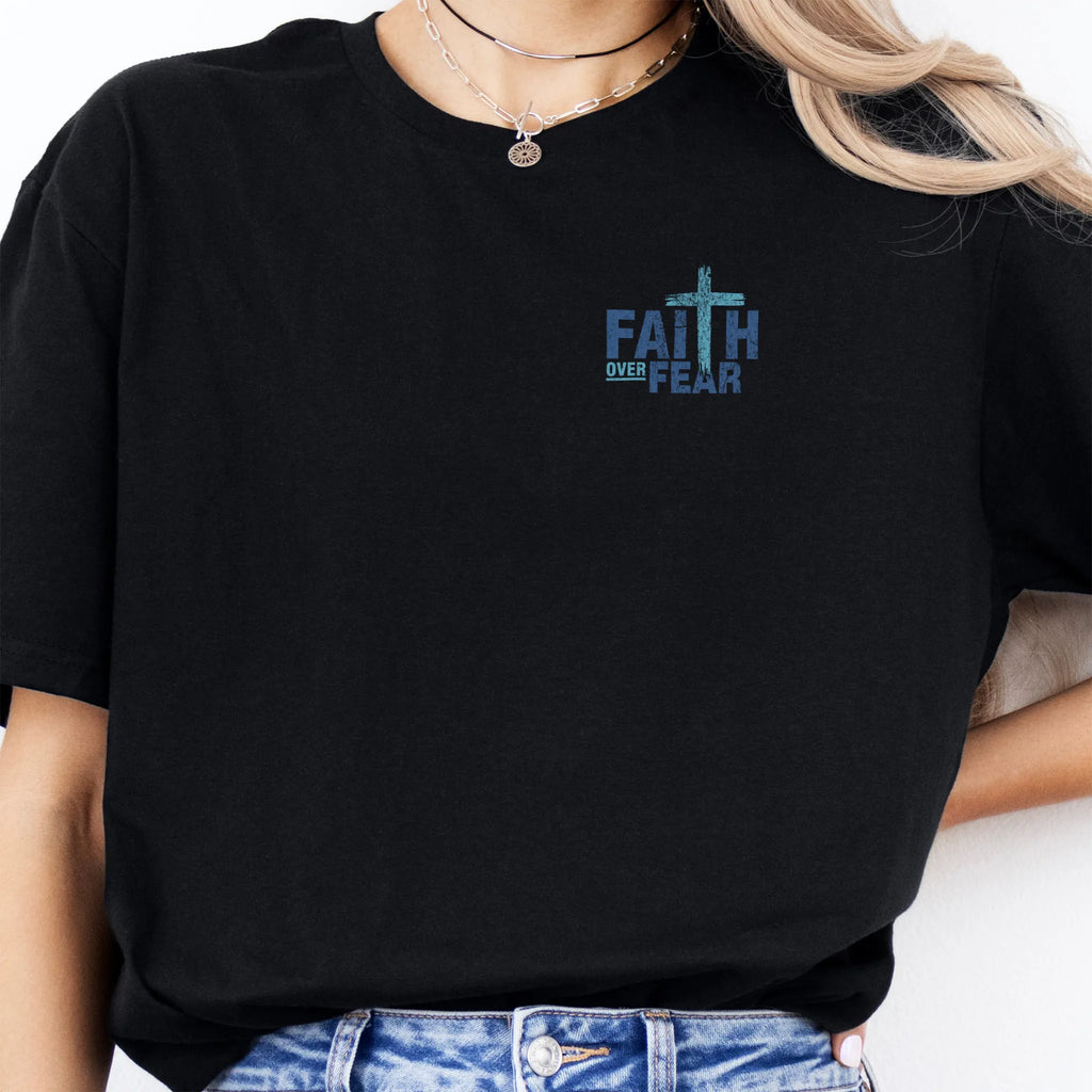 Black Oakley June t shirt, left chest badge reads Faith Over Fear with small cross, relaxed modern fit, studio front view