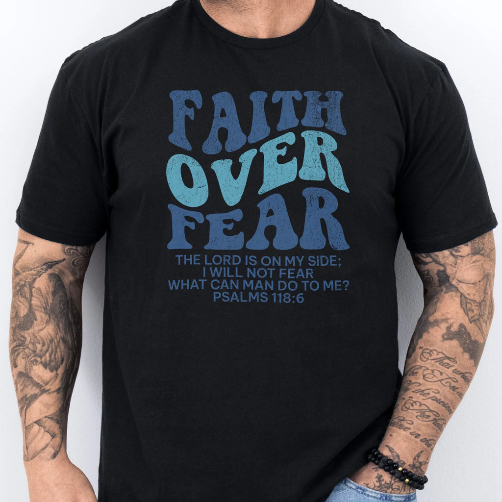 Black Oakley June t shirt, mens fit, large front lettering reads Faith Over Fear with supporting lines The Lord Is On My Side I Will Not Fear What Can Man Do To Me, studio front view