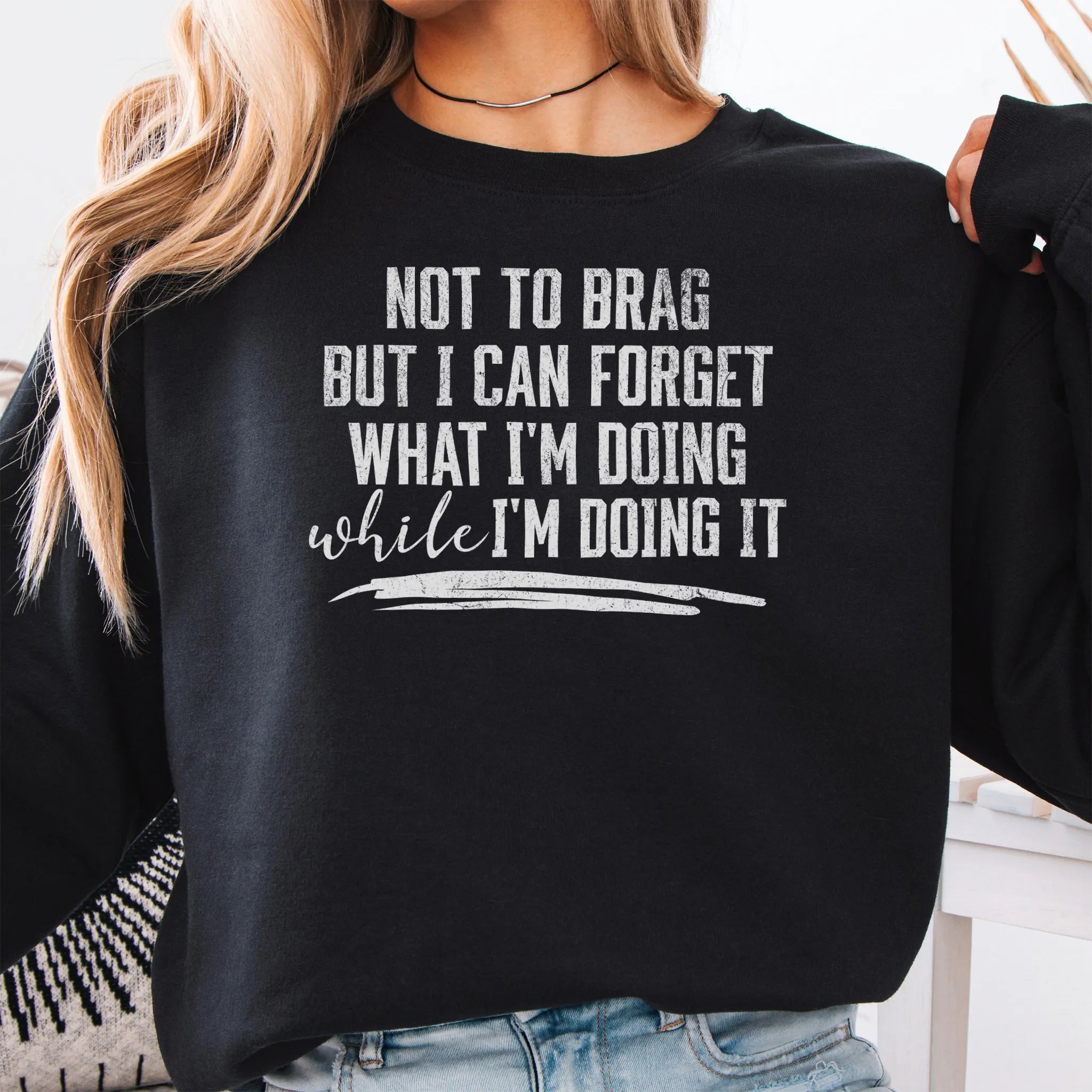 Black Oakley June Sweatshirt front view large text Not To Brag But I Can Forget What I’m Doing While I’m Doing It underline distressed print