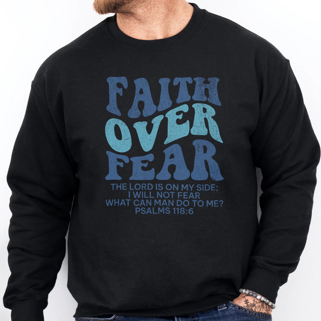 Black Oakley June sweatshirt, mens fit, large front lettering reads Faith Over Fear with supporting lines The Lord Is On My Side I Will Not Fear What Can Man Do To Me, studio front view