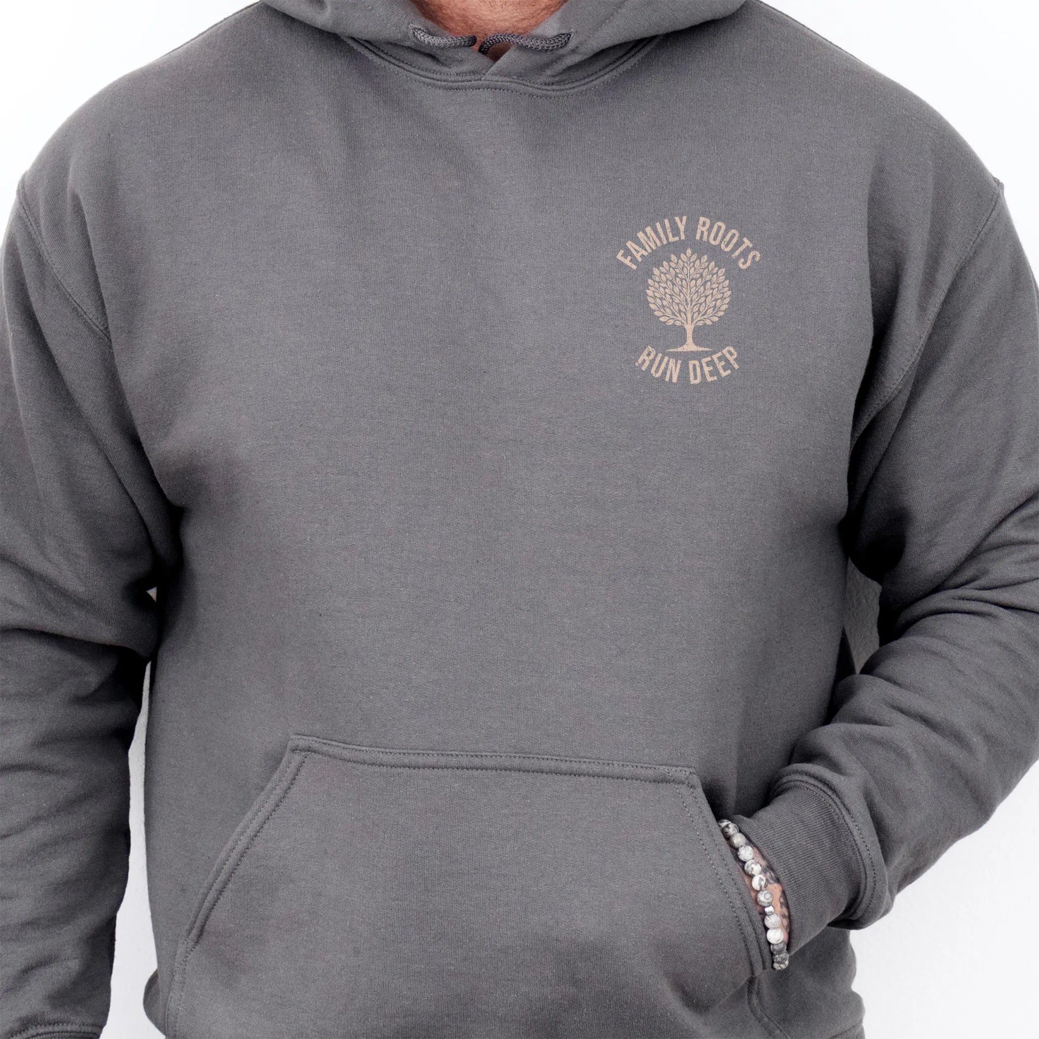Charcoal Oakley June hoodie left chest tree badge reading Family Roots Run Deep