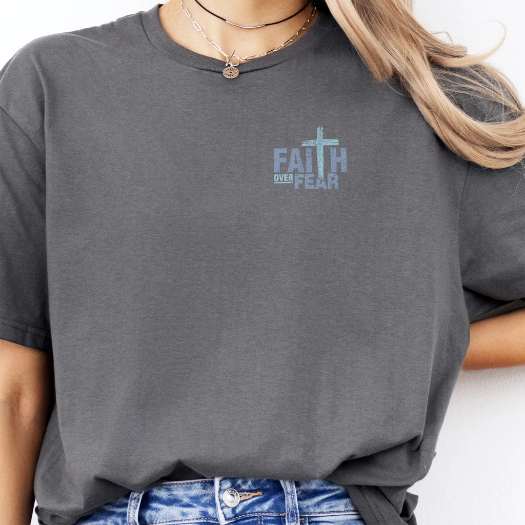 Charcoal Oakley June t shirt, left chest badge reads Faith Over Fear with small cross, relaxed modern fit, studio front view