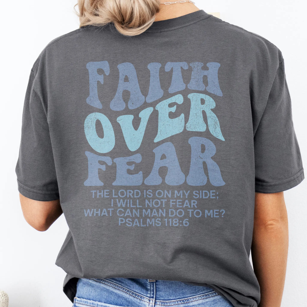 Charcoal Oakley June t shirt, large back lettering reads Faith Over Fear with supporting scripture lines, studio back view