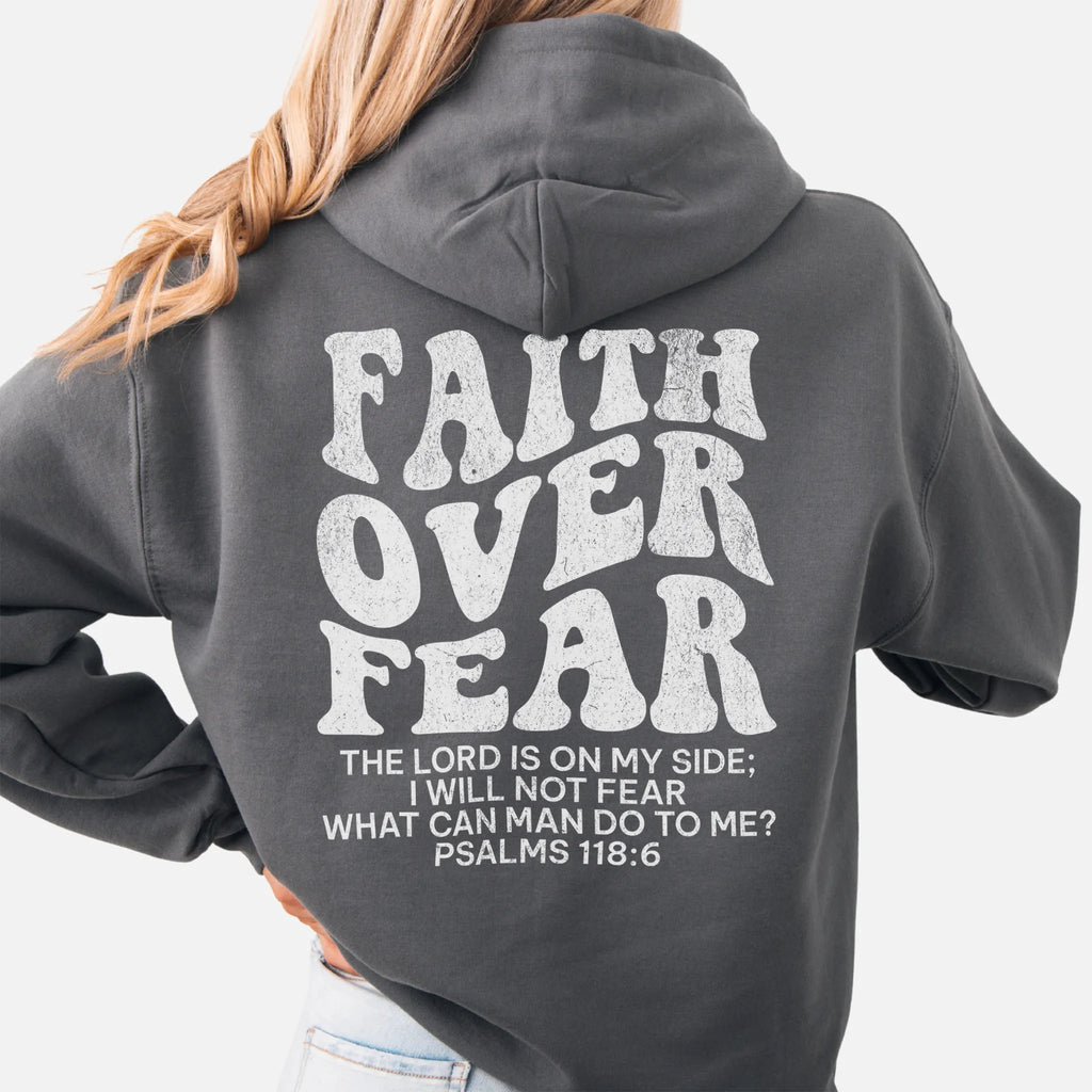 Charcoal Oakley June hoodie, large back lettering reads Faith Over Fear with supporting scripture lines, hood up, studio back view