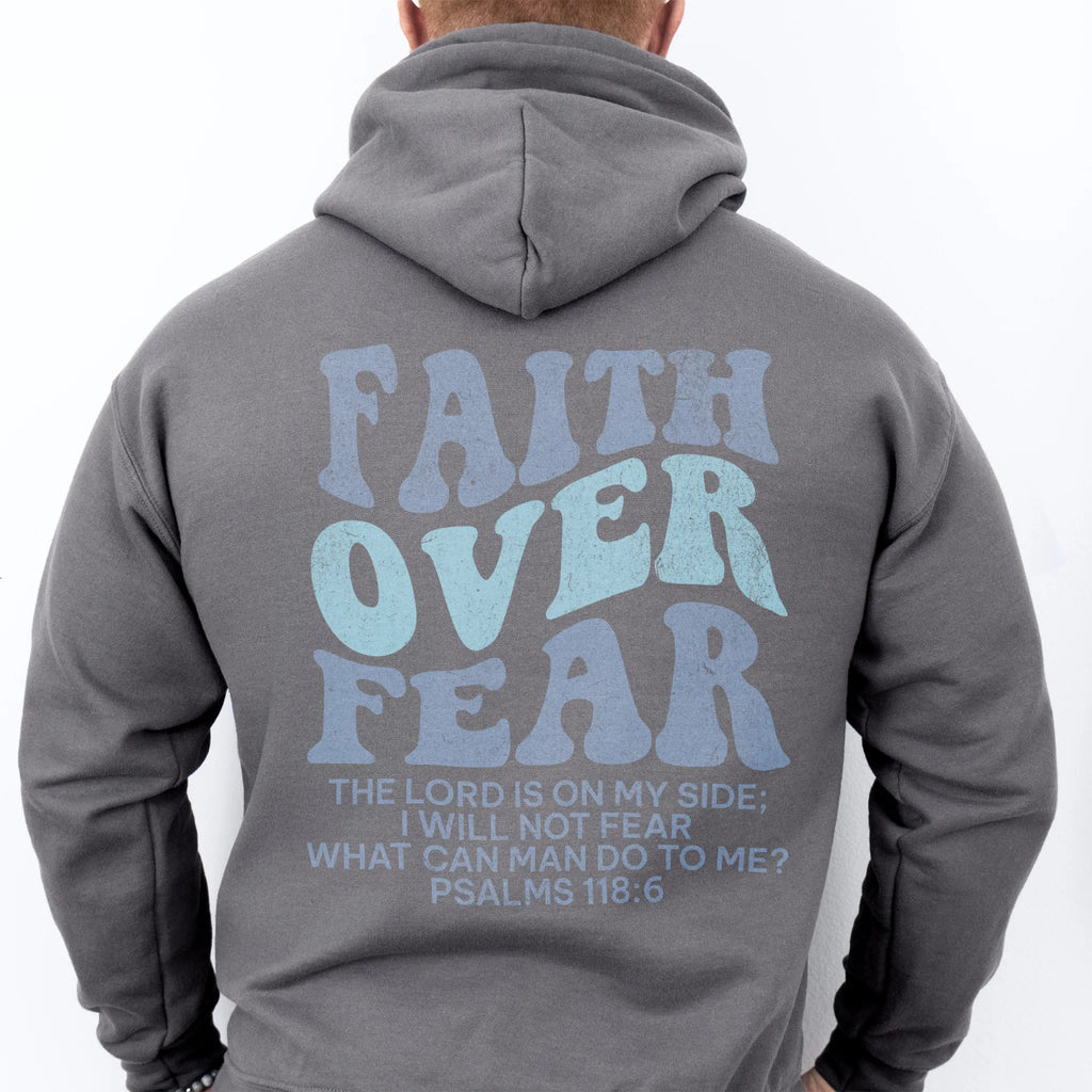 Charcoal Oakley June hoodie, mens fit, large back lettering reads Faith Over Fear with supporting scripture lines, hood up, studio back view