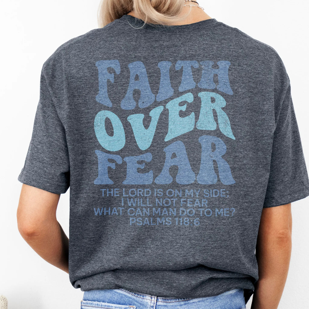 Dark Heather Oakley June t shirt, large back lettering reads Faith Over Fear with supporting scripture lines, studio back view