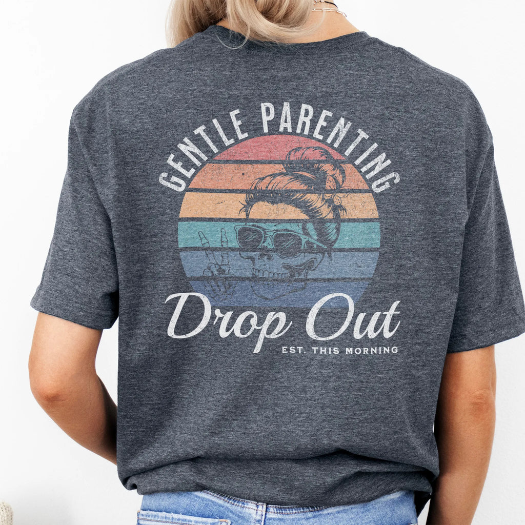 Dark Heather Oakley June T Shirt back view Gentle Parenting Drop Out large round retro badge skull with messy bun wearing sunglasses peace sign script Est This Morning distressed print