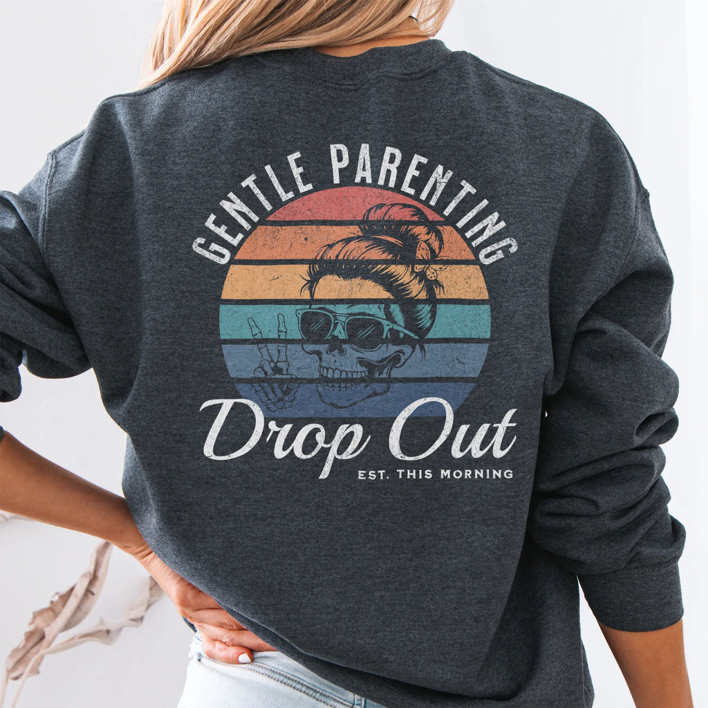Dark Heather Oakley June Sweatshirt back view Gentle Parenting Drop Out large round retro stripe badge skull with messy bun peace sign script Est This Morning distressed print