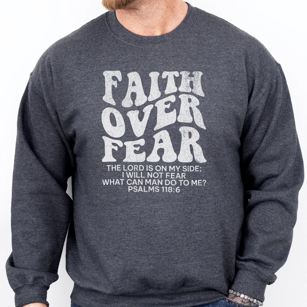 Dark Heather Oakley June sweatshirt, mens fit, left chest badge reads Faith Over Fear with cross, studio front view