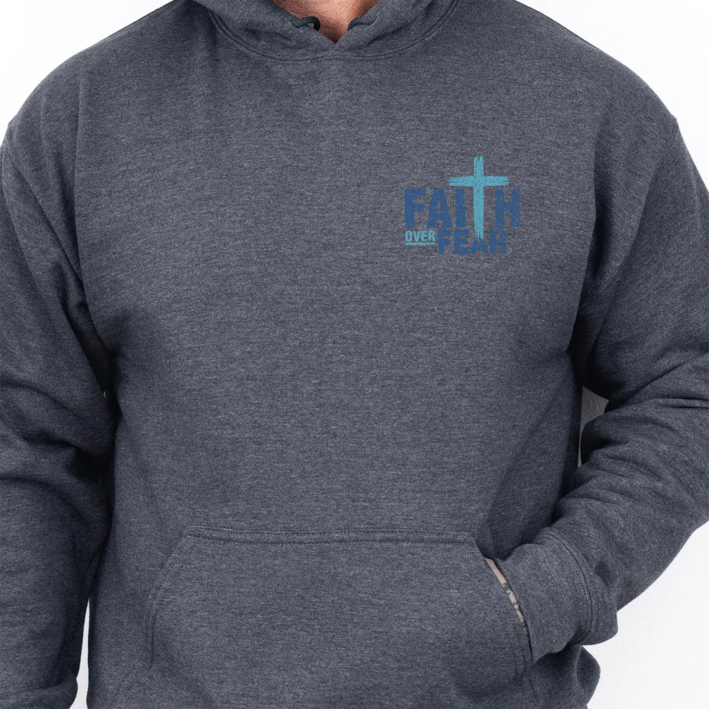 Dark Heather Oakley June hoodie, mens fit, left chest badge reads Faith Over Fear with cross, kangaroo pocket and relaxed modern fit, studio front view