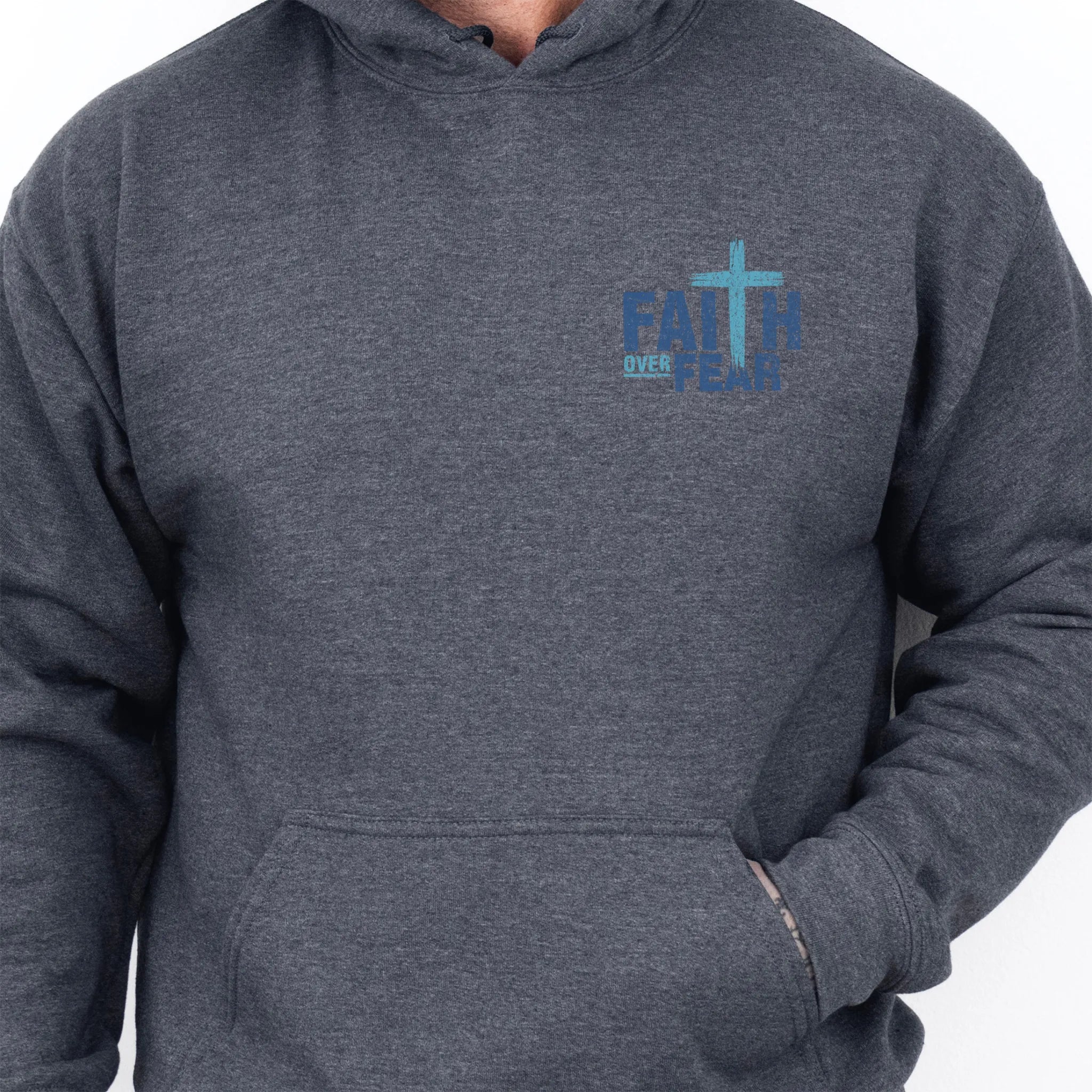 Dark Heather Oakley June hoodie, mens fit, left chest badge reads Faith Over Fear with cross, kangaroo pocket and relaxed modern fit, studio front view
