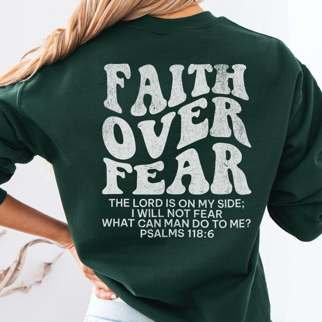 Forest Green Oakley June sweatshirt, large back lettering reads Faith Over Fear with supporting scripture lines, studio back view