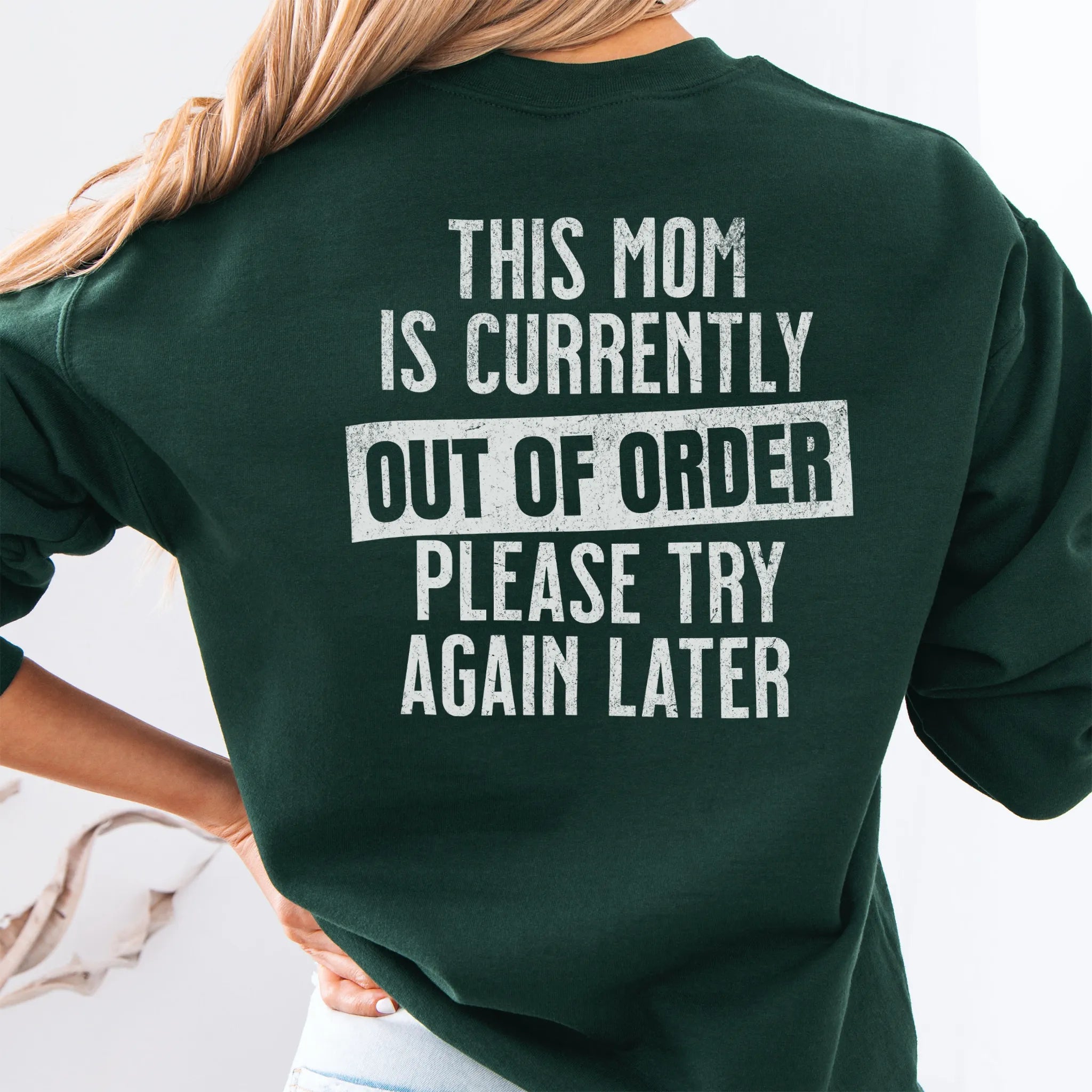 Forest Green sweatshirt – large back text “This Mom Is Currently Out of Order, Please Try Again Later”, relaxed modern fit, studio back view