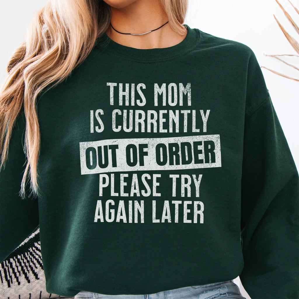 Forest Green sweatshirt – large front text reads “This Mom Is Currently Out of Order, Please Try Again Later”, relaxed modern fit, cropped to torso, studio front view