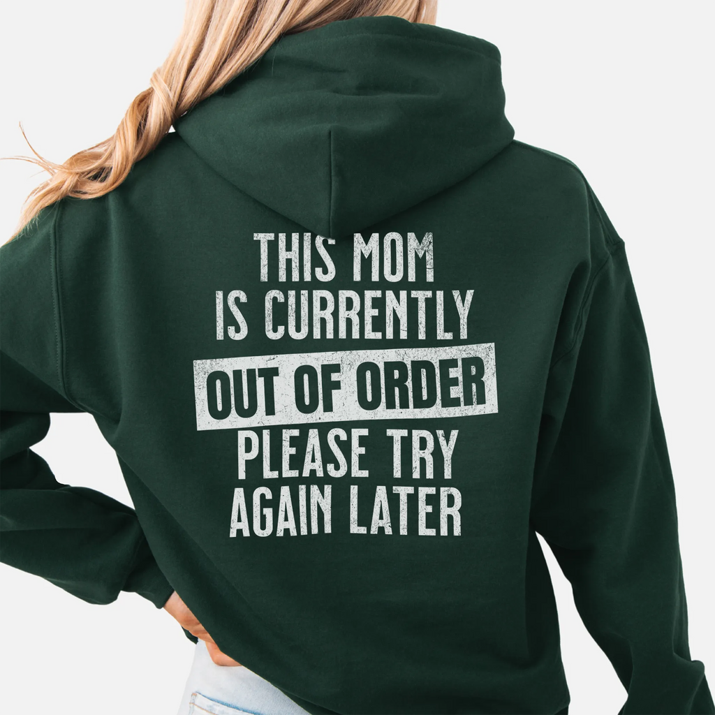 Forest Green hoodie – large back text reads “This Mom Is Currently Out of Order, Please Try Again Later”, relaxed modern fit with hood up, studio back view