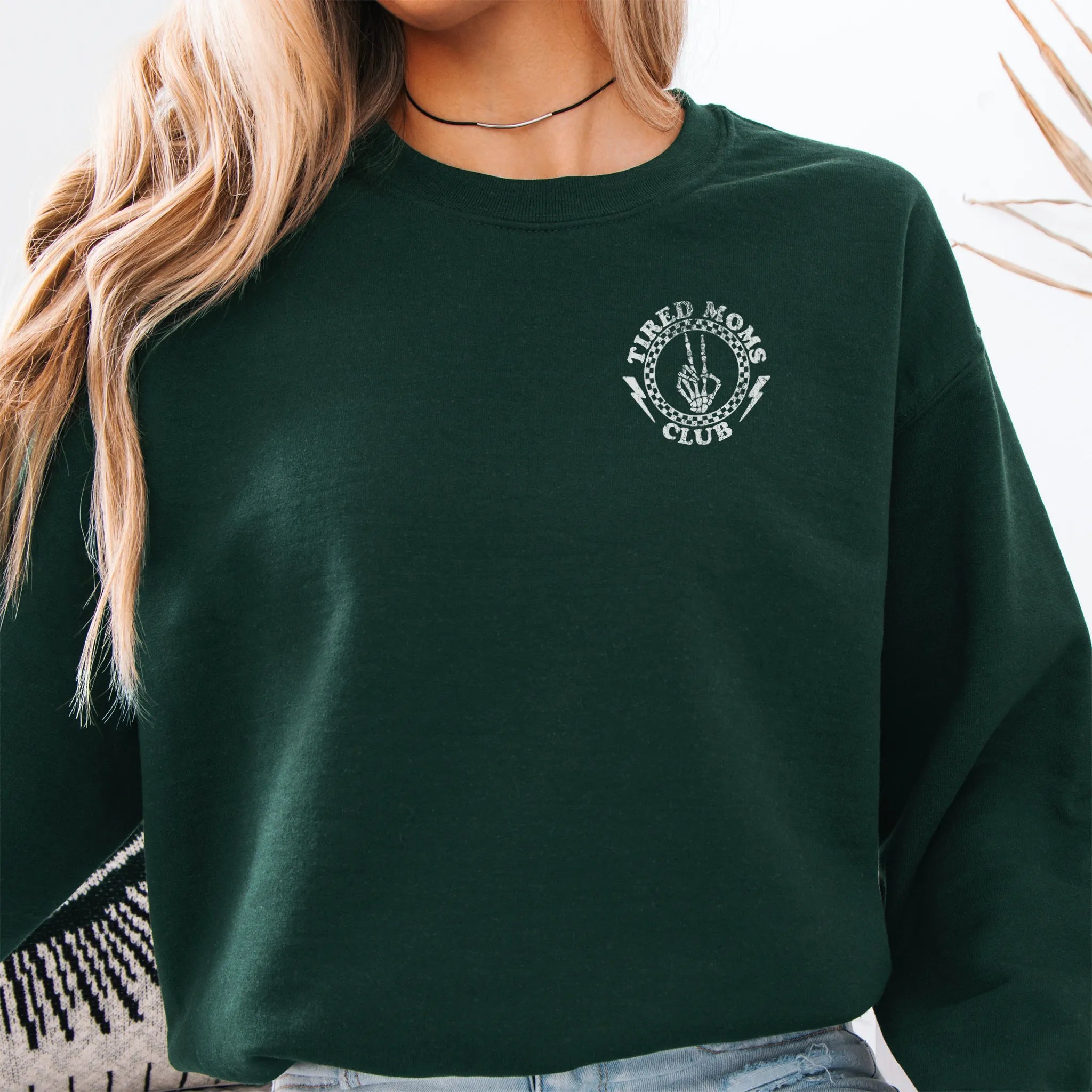 Forest Green Oakley June Sweatshirt front view small left chest Tired Moms Club badge crest distressed print