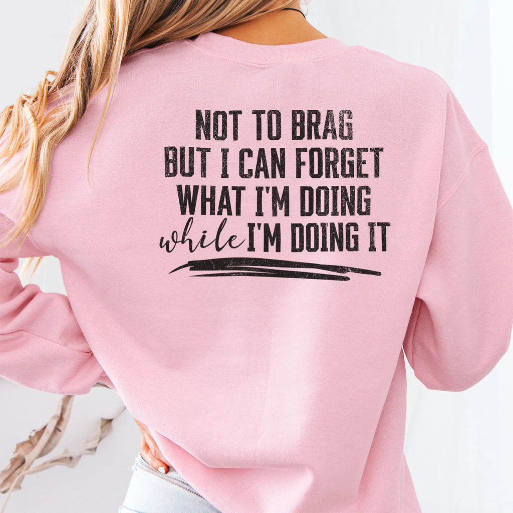Light Pink Oakley June Sweatshirt back view large text Not To Brag But I Can Forget What I’m Doing While I’m Doing It underline distressed print