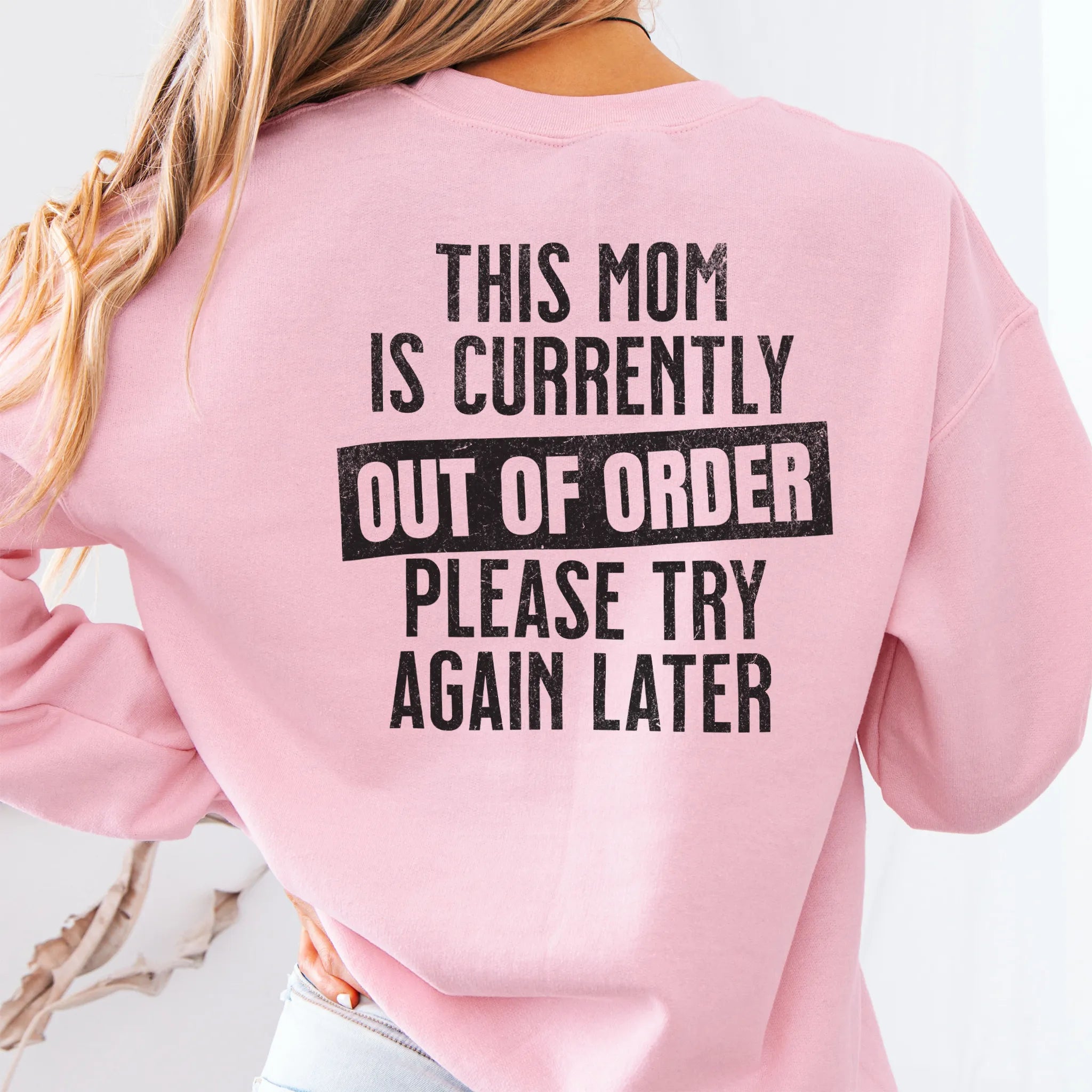 Light Pink sweatshirt – large back text “This Mom Is Currently Out of Order, Please Try Again Later”, relaxed modern fit, studio back view