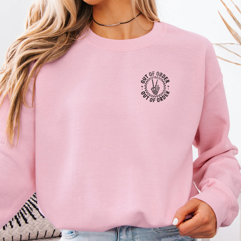 Light Pink sweatshirt – left chest “Out of Order” circular badge, relaxed modern fit, cropped to torso, studio front view