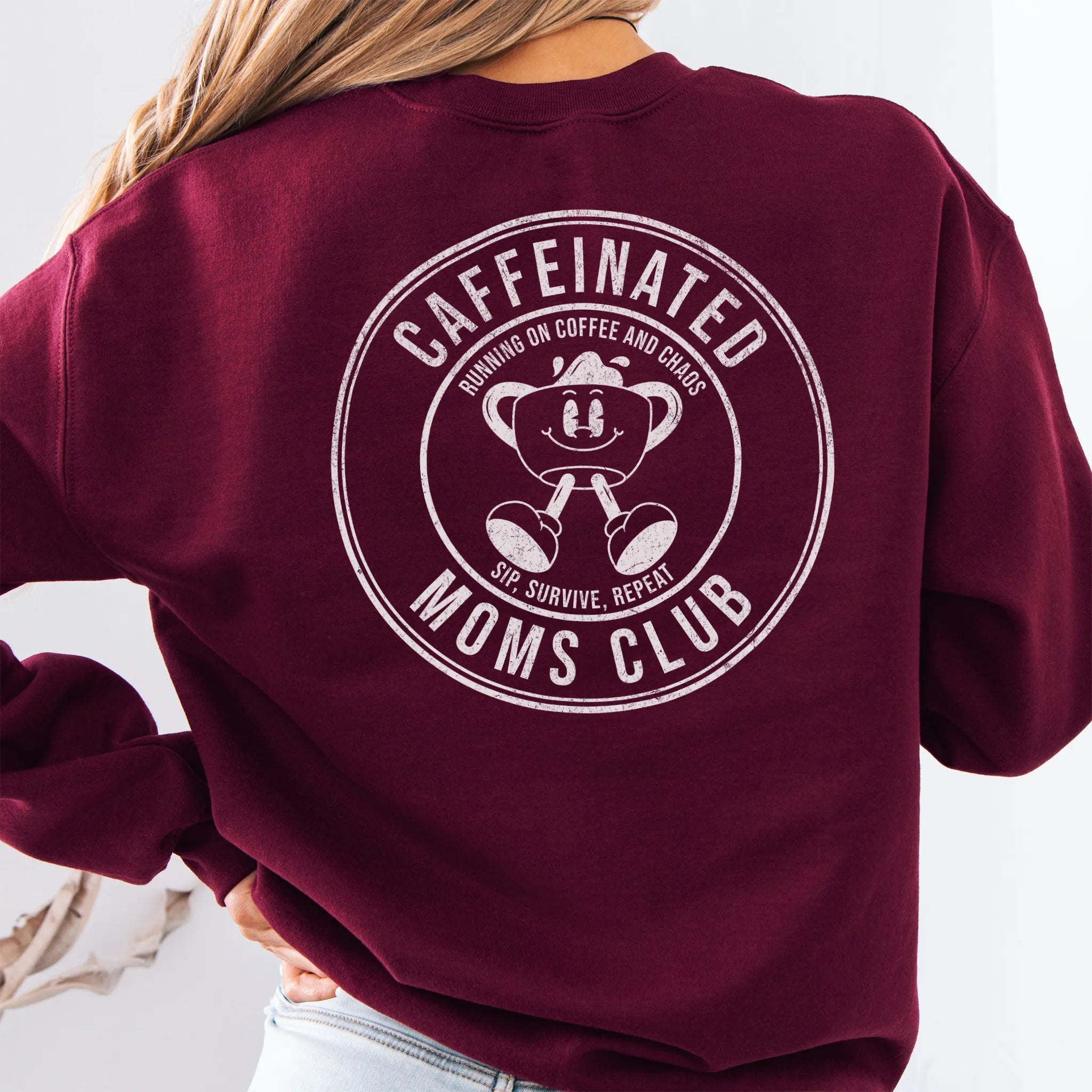 Maroon Oakley June Sweatshirt front view small left chest coffee cup mascot Caffeinated Moms Club minimal distressed