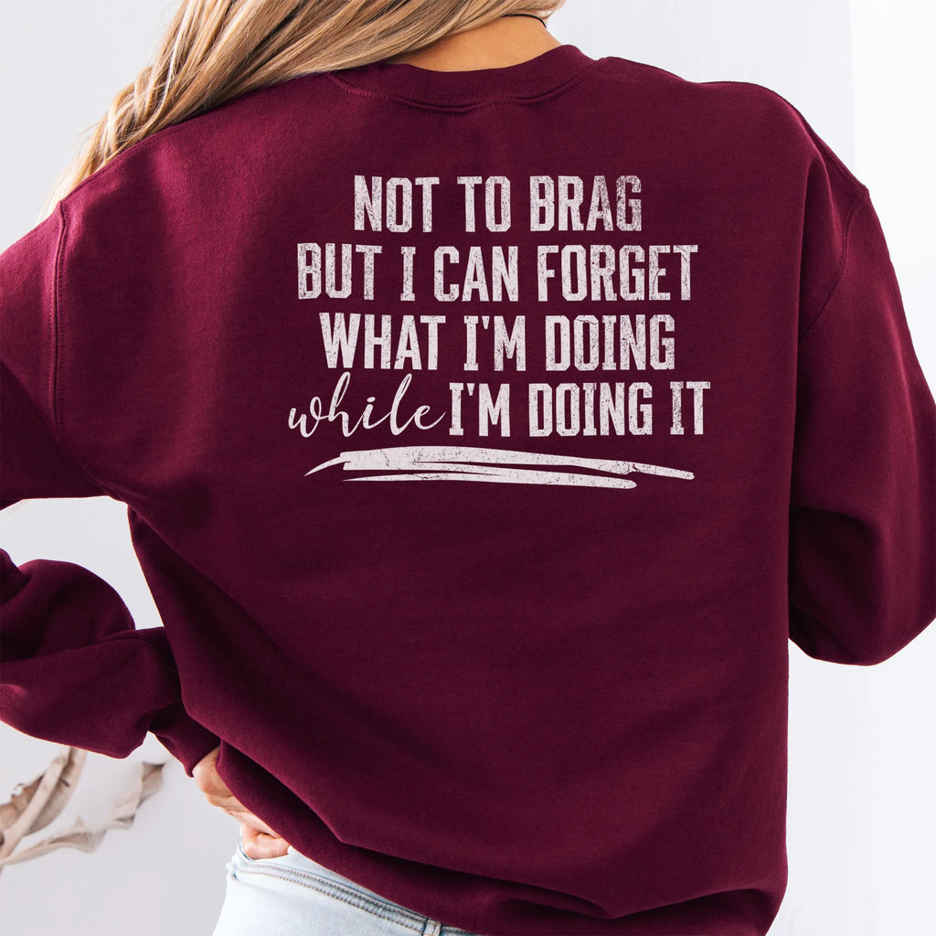 Maroon Oakley June Sweatshirt back view large text Not To Brag But I Can Forget What I’m Doing While I’m Doing It underline distressed print