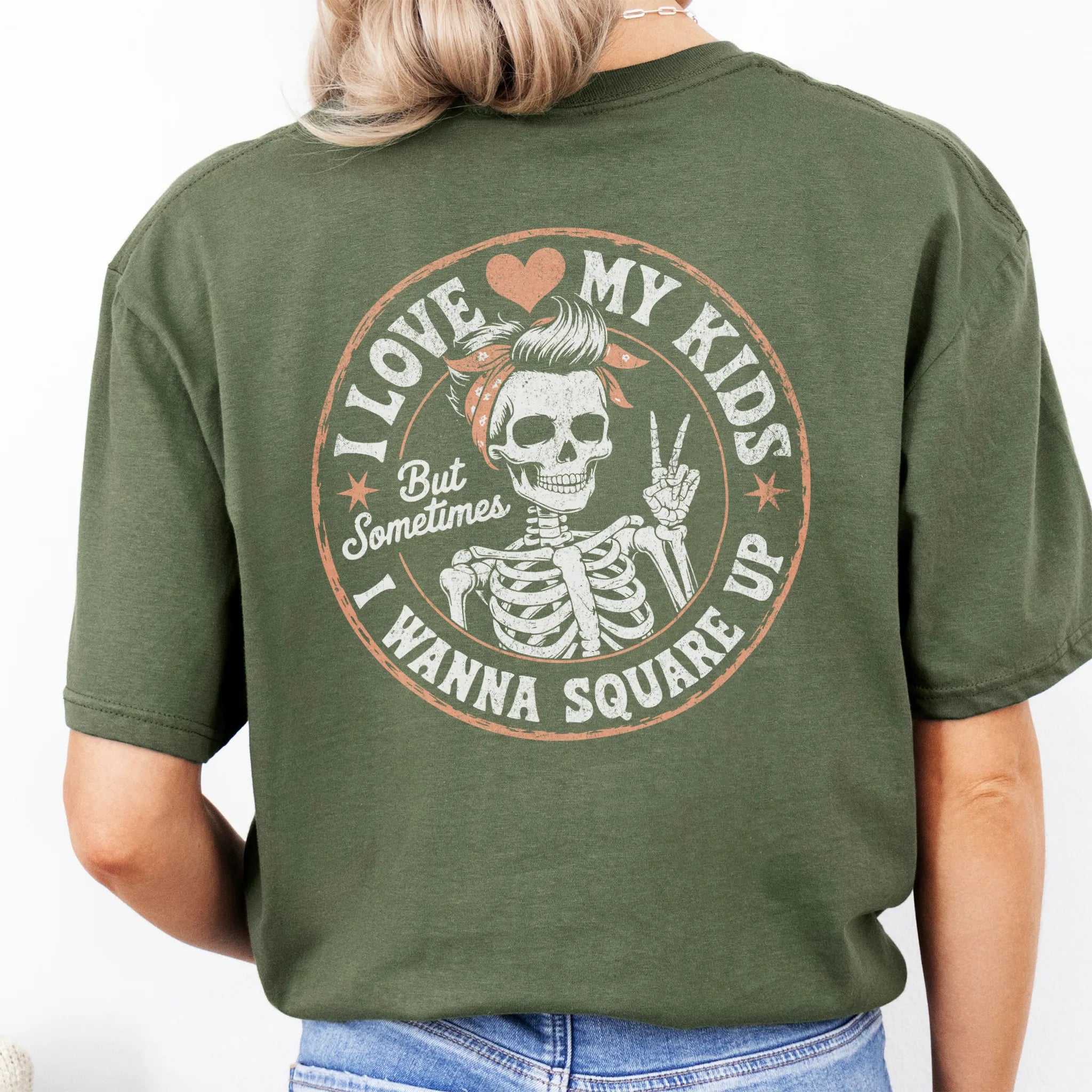 Military Green t-shirt – large back graphic with skeleton mom in bandana and peace sign inside a round badge, headline reads “I Love My Kids But Sometimes I Wanna Square Up”, studio back view