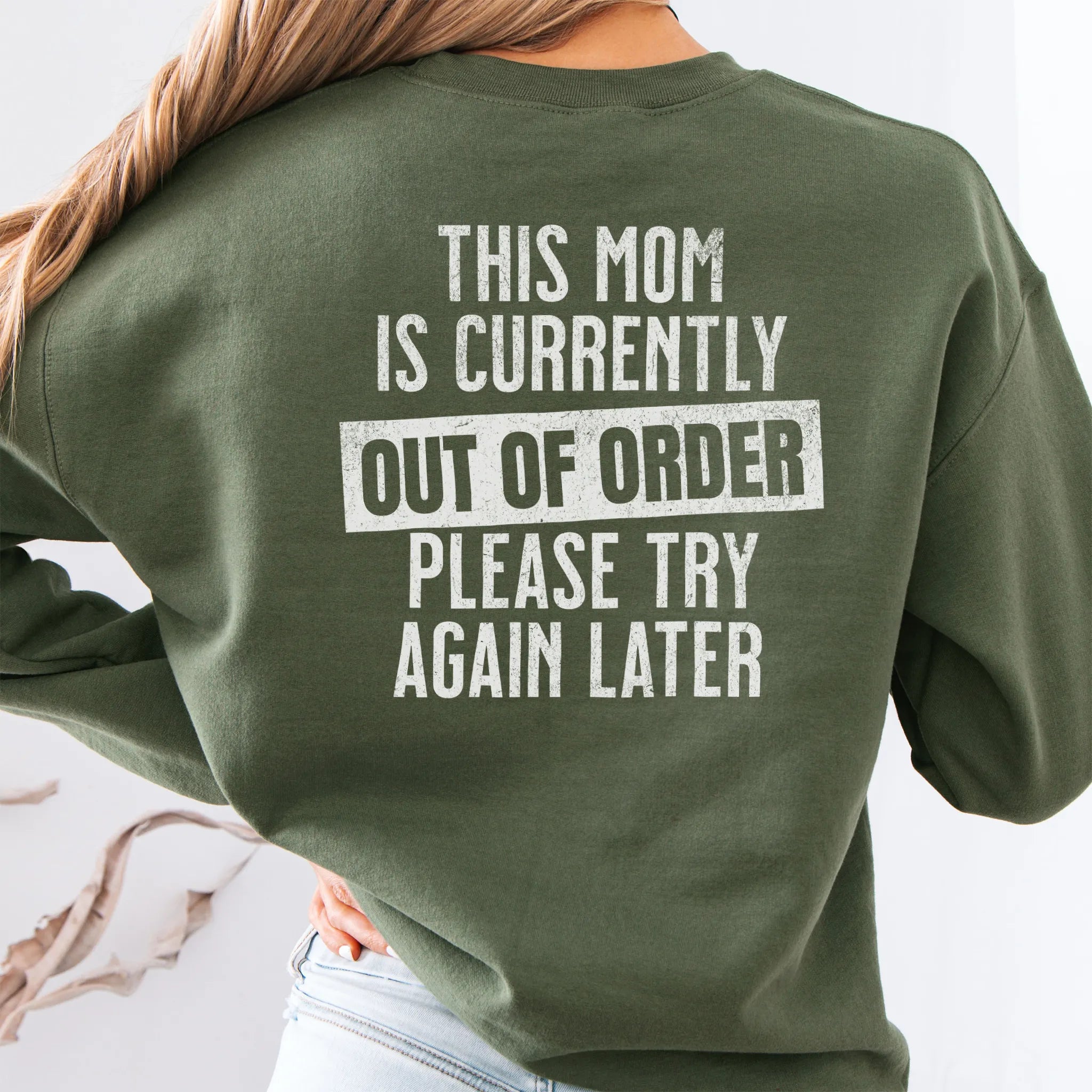 Military Green sweatshirt – large back text “This Mom Is Currently Out of Order, Please Try Again Later”, relaxed modern fit, studio back view