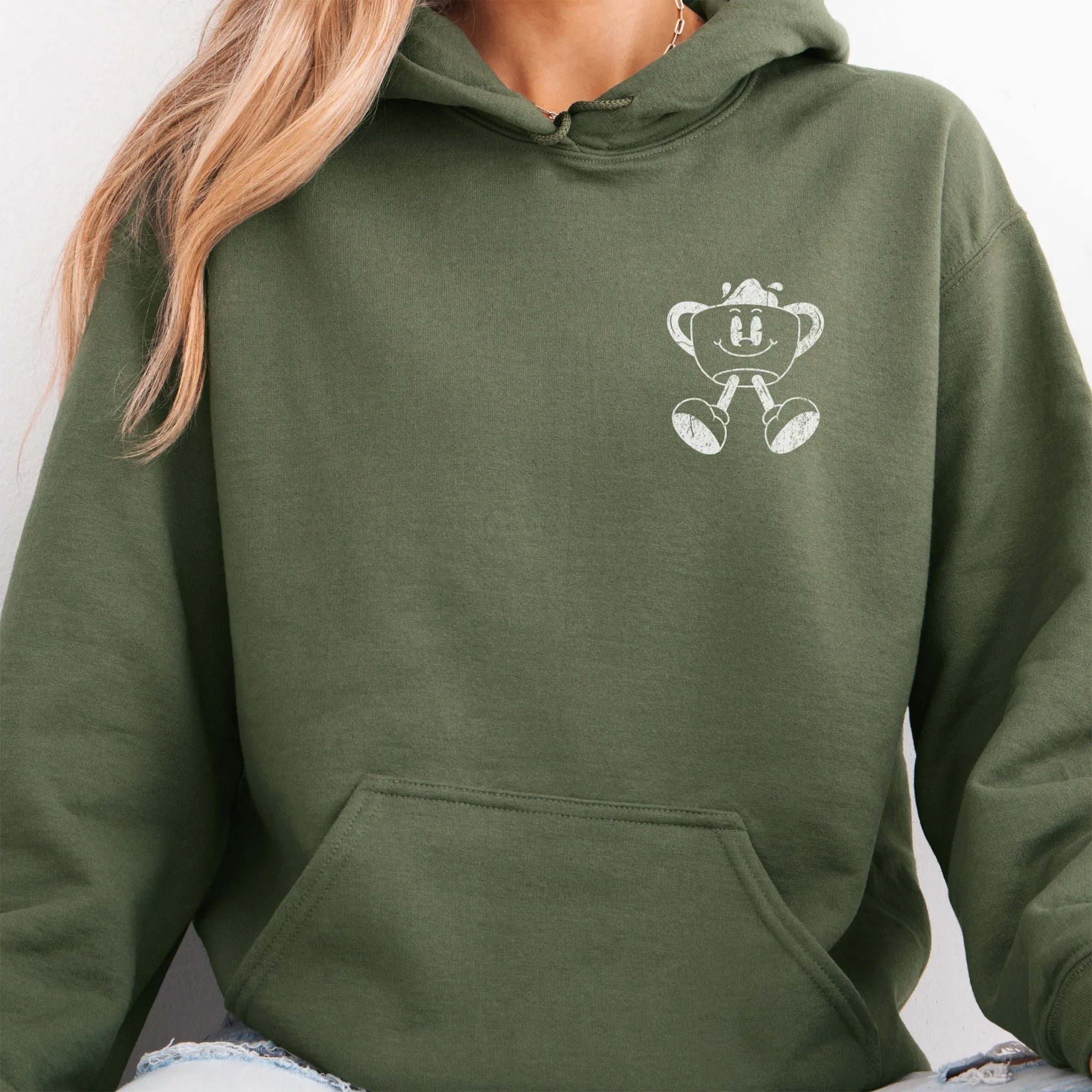 Military Green Oakley June Hoodie front view small left chest coffee cup mascot Caffeinated Moms Club kangaroo pocket drawstrings visible distressed print