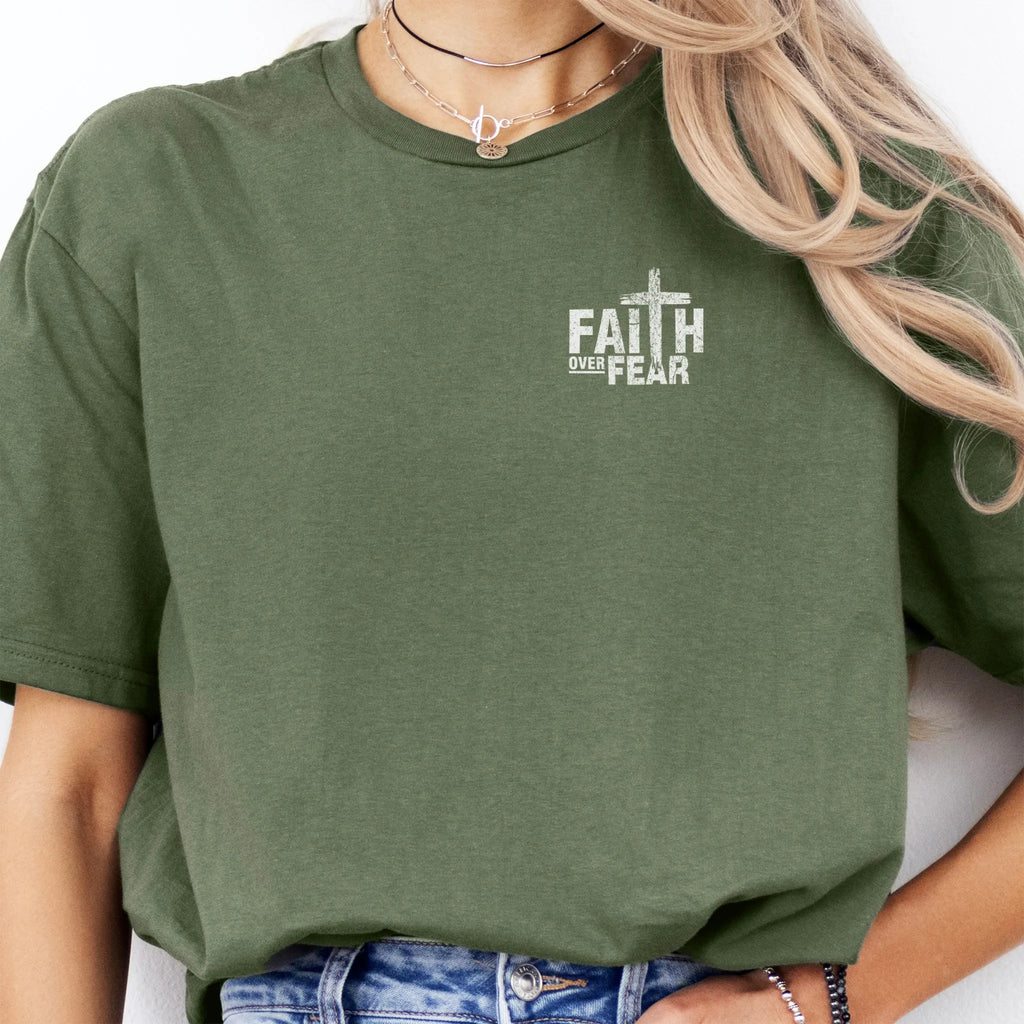 Military Green Oakley June t shirt, left chest badge reads Faith Over Fear with small cross, relaxed modern fit, studio front view