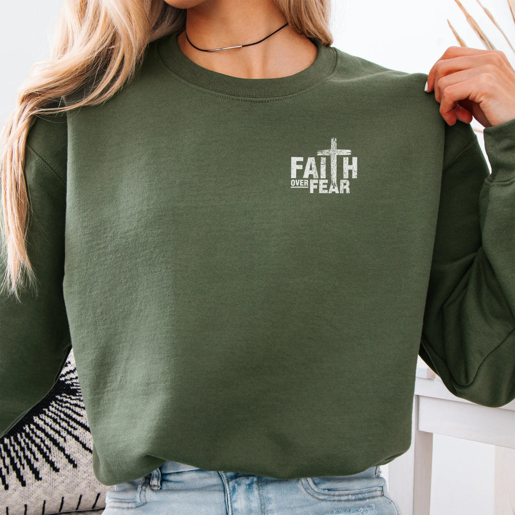 Military Green Oakley June sweatshirt, left chest badge reads Faith Over Fear with small cross, relaxed modern fit, studio front view